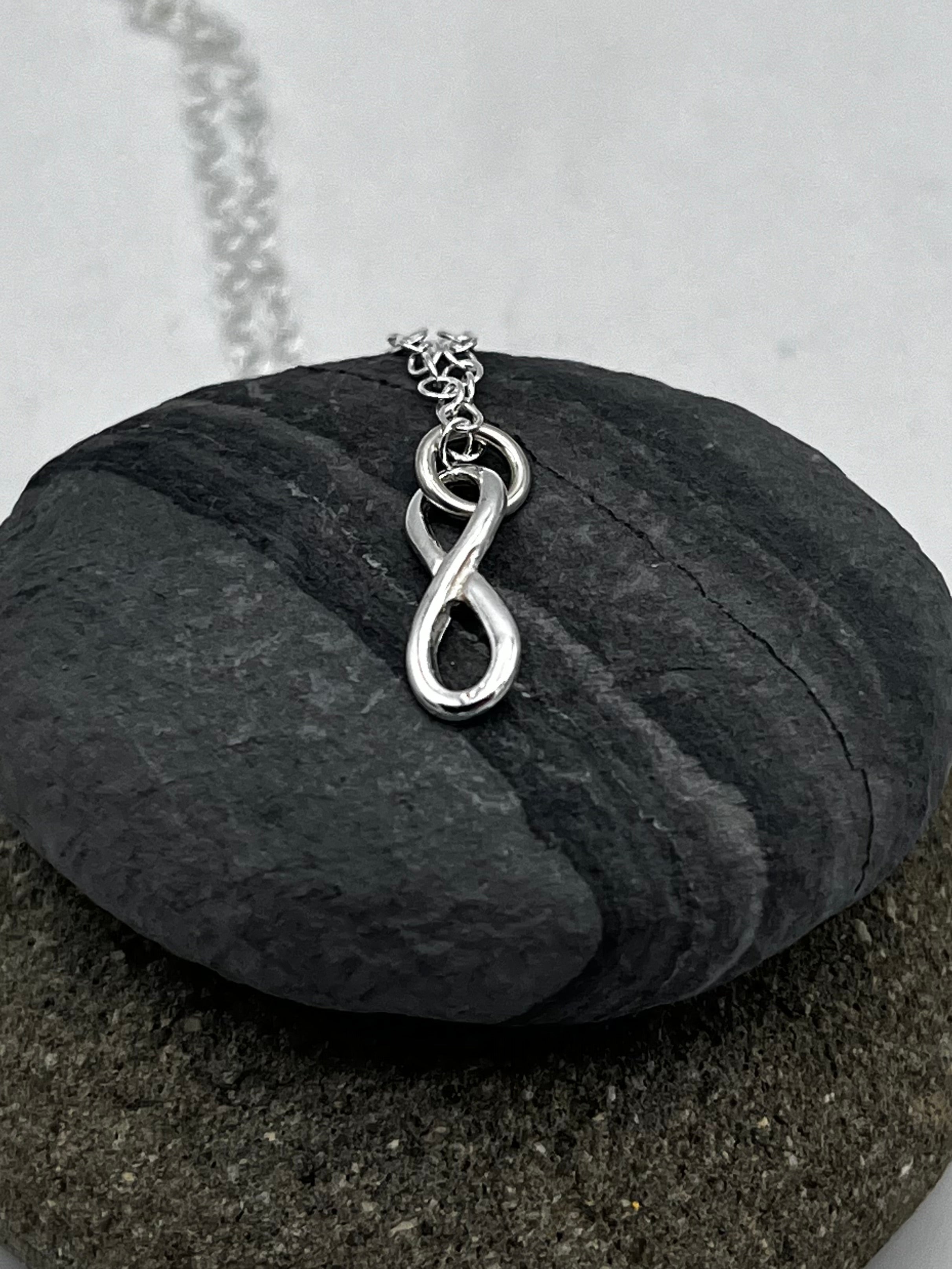Sterling silver polished Infinity design 16mm long pendant and 16" chain