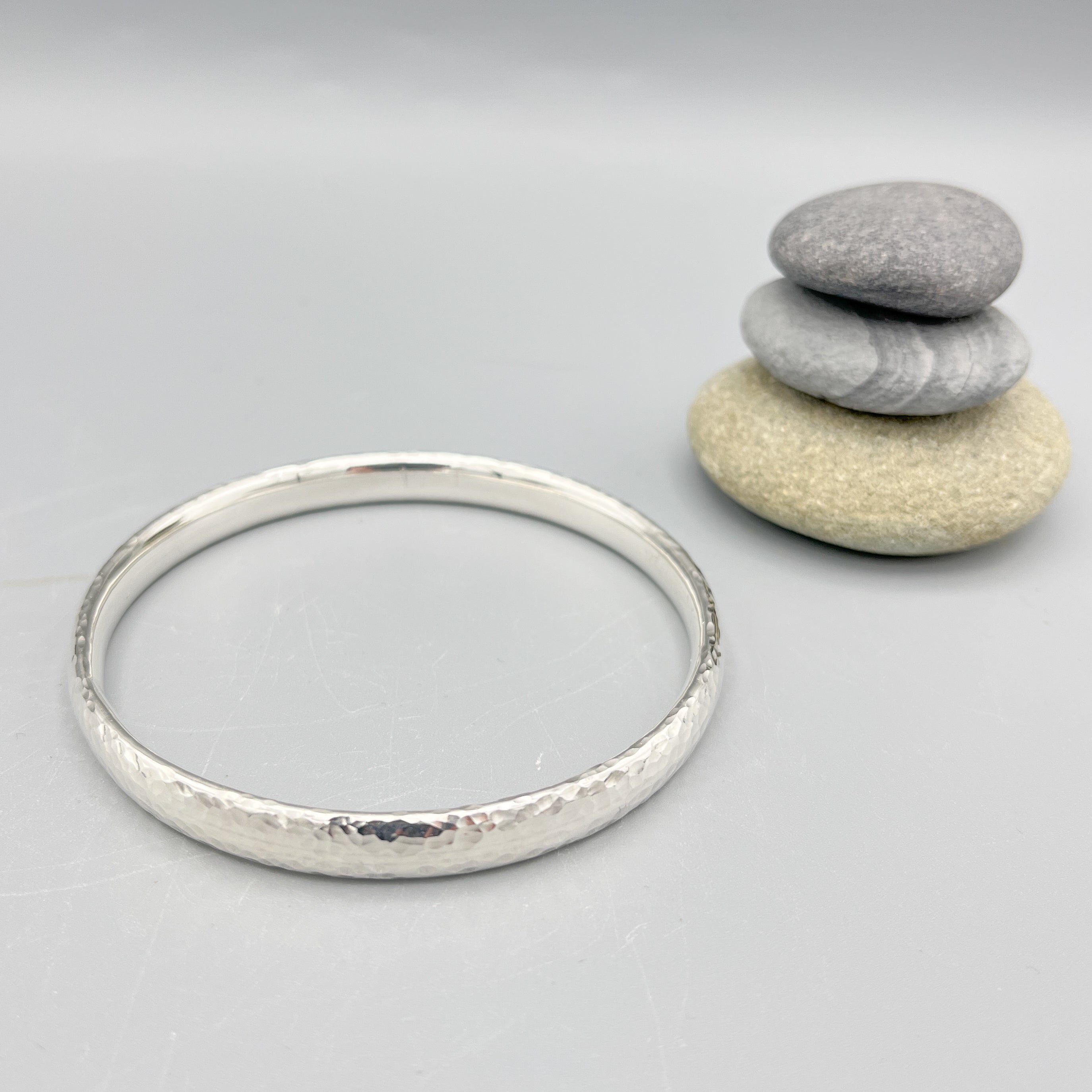 Sterling Silver Bangle, oval design with a hammered finish