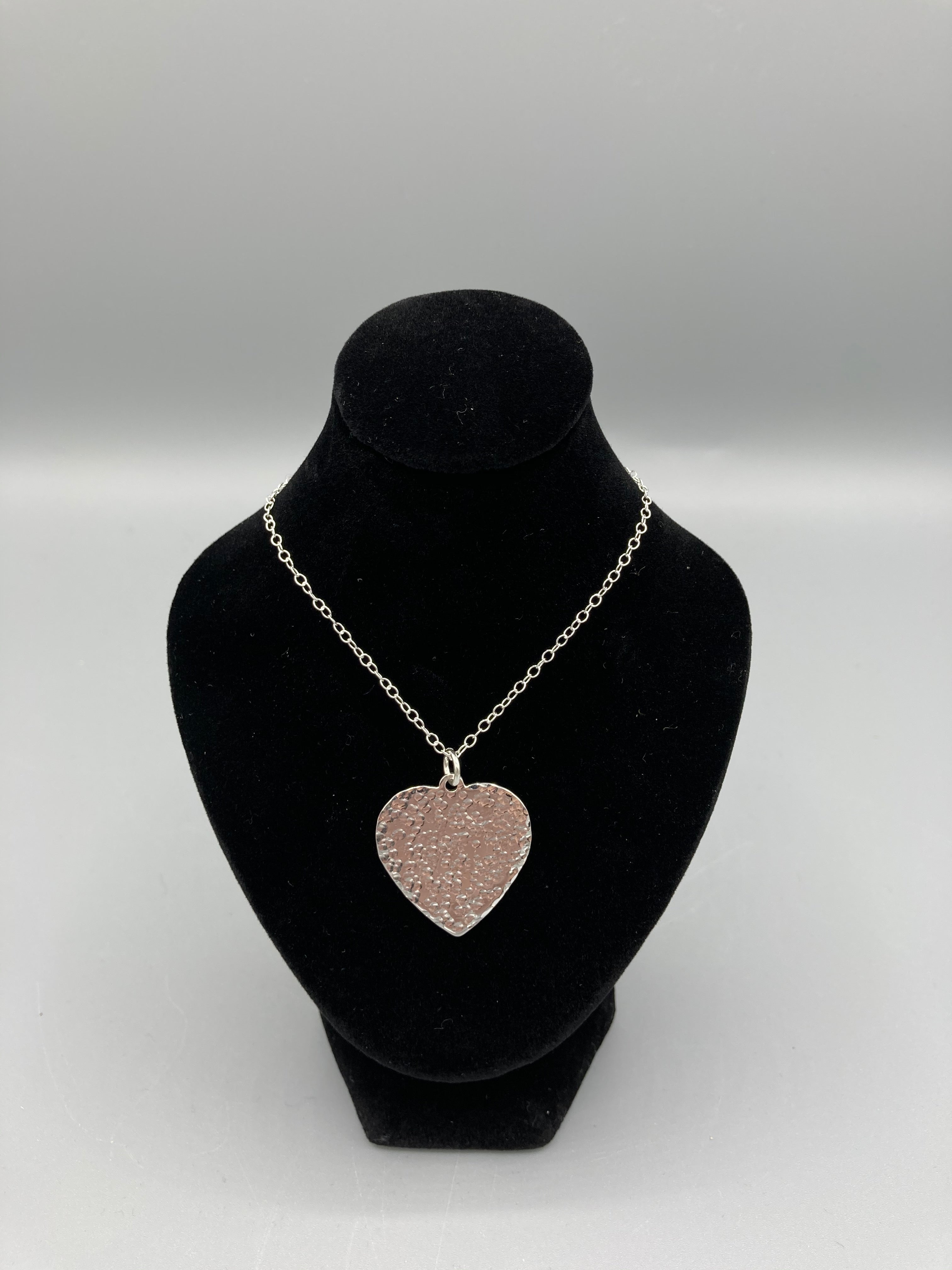 Single heart pendant 25mm wide hammered finish on 16" trace chain