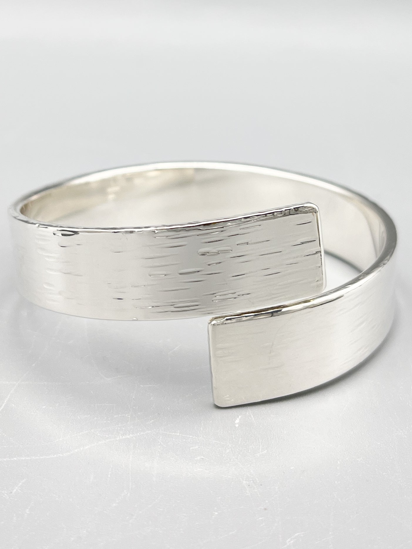 Sterling Silver Bangle, rectangular design with a 'bark' hammered finish