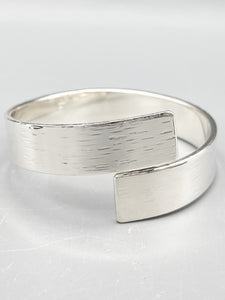 Sterling Silver Bangle, rectangular design with a 'bark' hammered finish