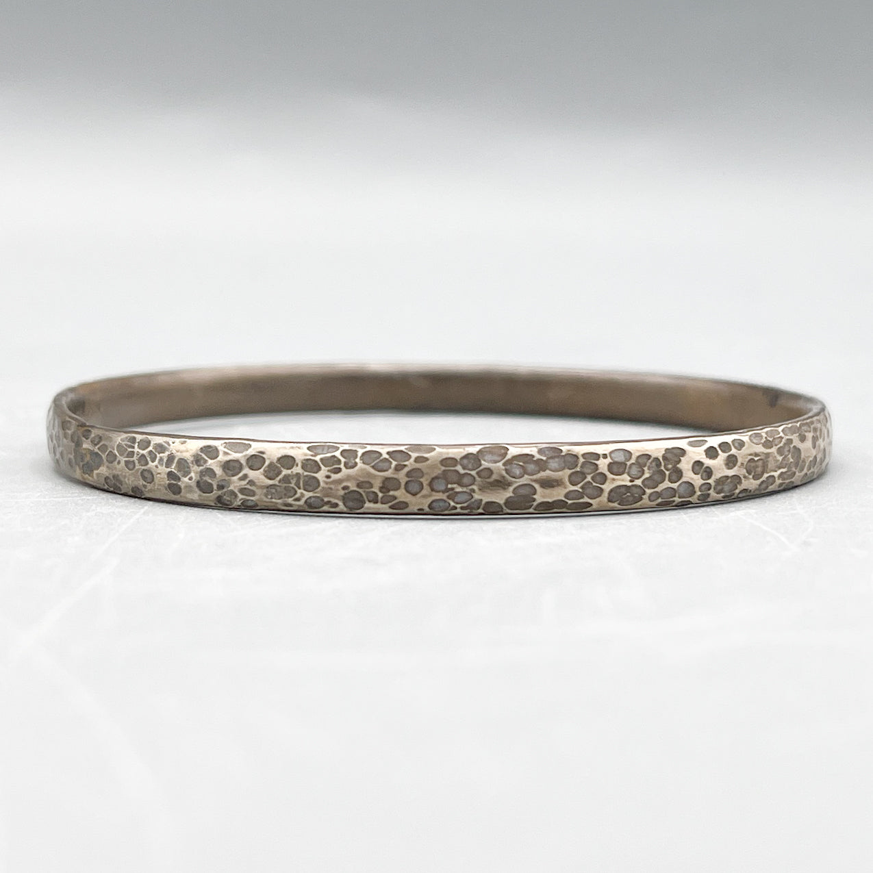 Sterling Silver Bangle. Hammered & oxidised finish 5.4mm wide