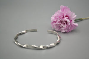 Sterling Silver Bangle, 5mm wide, twisted design with a polished finish