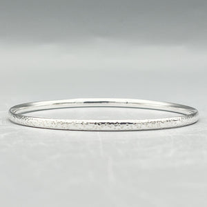 Sterling Silver Bangle, oval 'star hammered' finish (3.5mm wide)