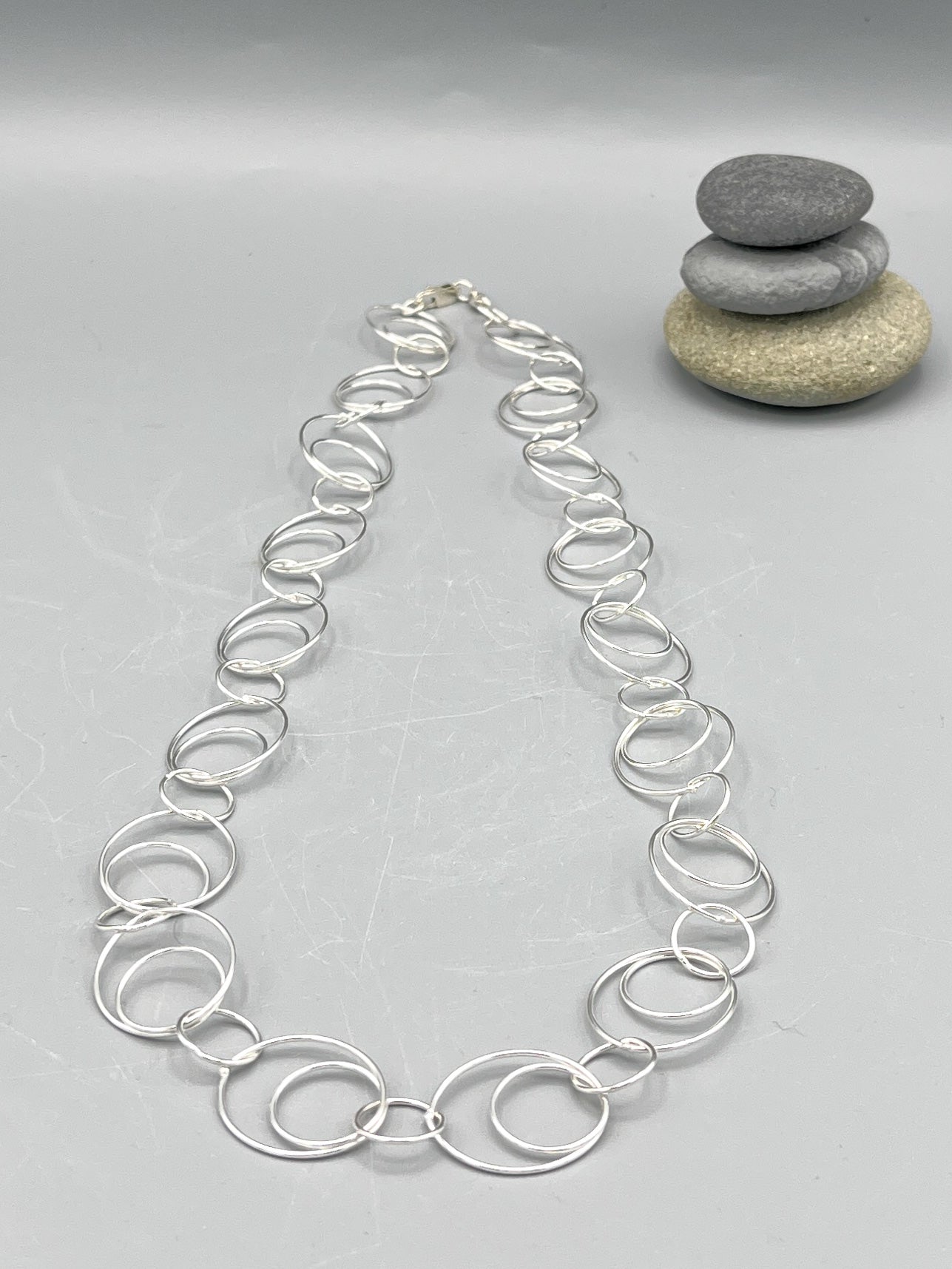Sterling Silver Necklace. 19” (480mm) long polished round ring necklace