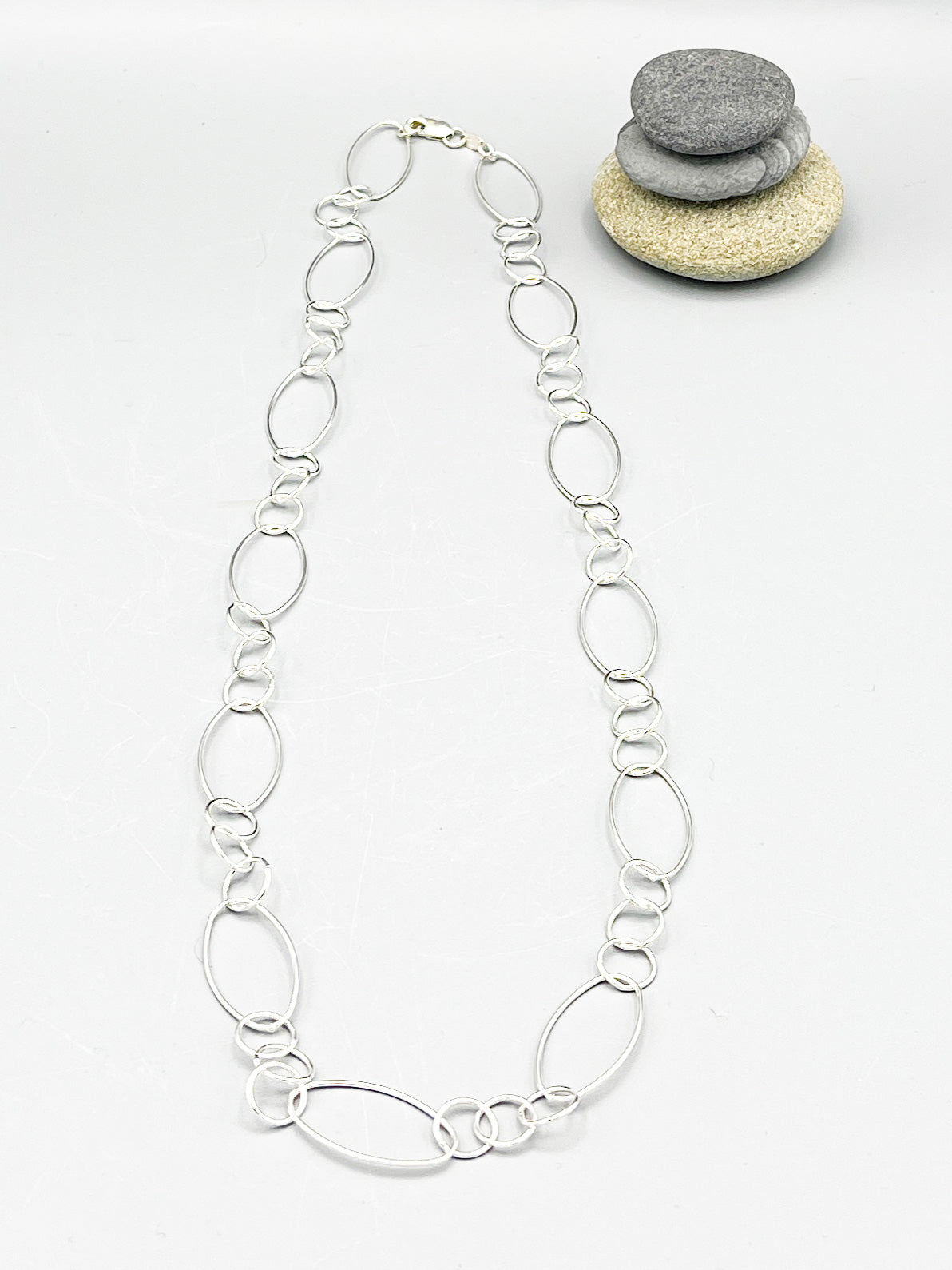 Sterling Silver Necklace. 26” long polished round ring necklace