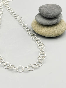 Sterling Silver Necklace. 36” loose round cable link with lobster claw clasp