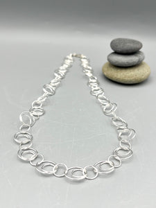 Sterling Silver Necklace. 20” long polished fancy round link necklace