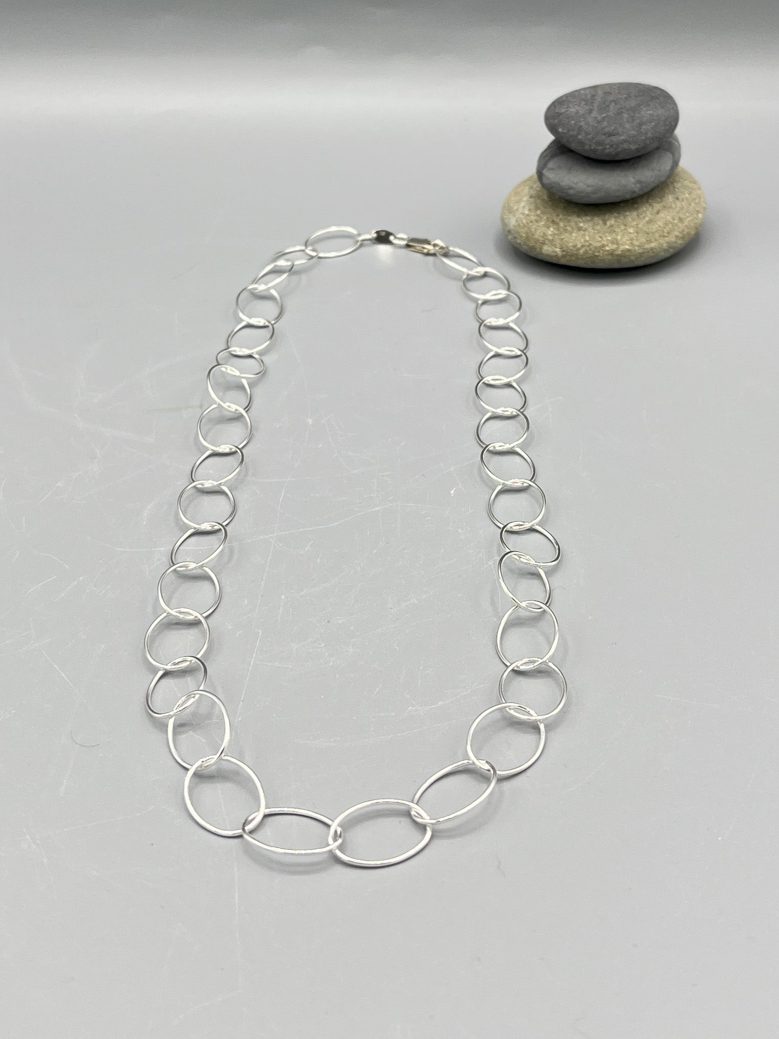Sterling Silver Necklace. 21” long polished fancy oval link necklace