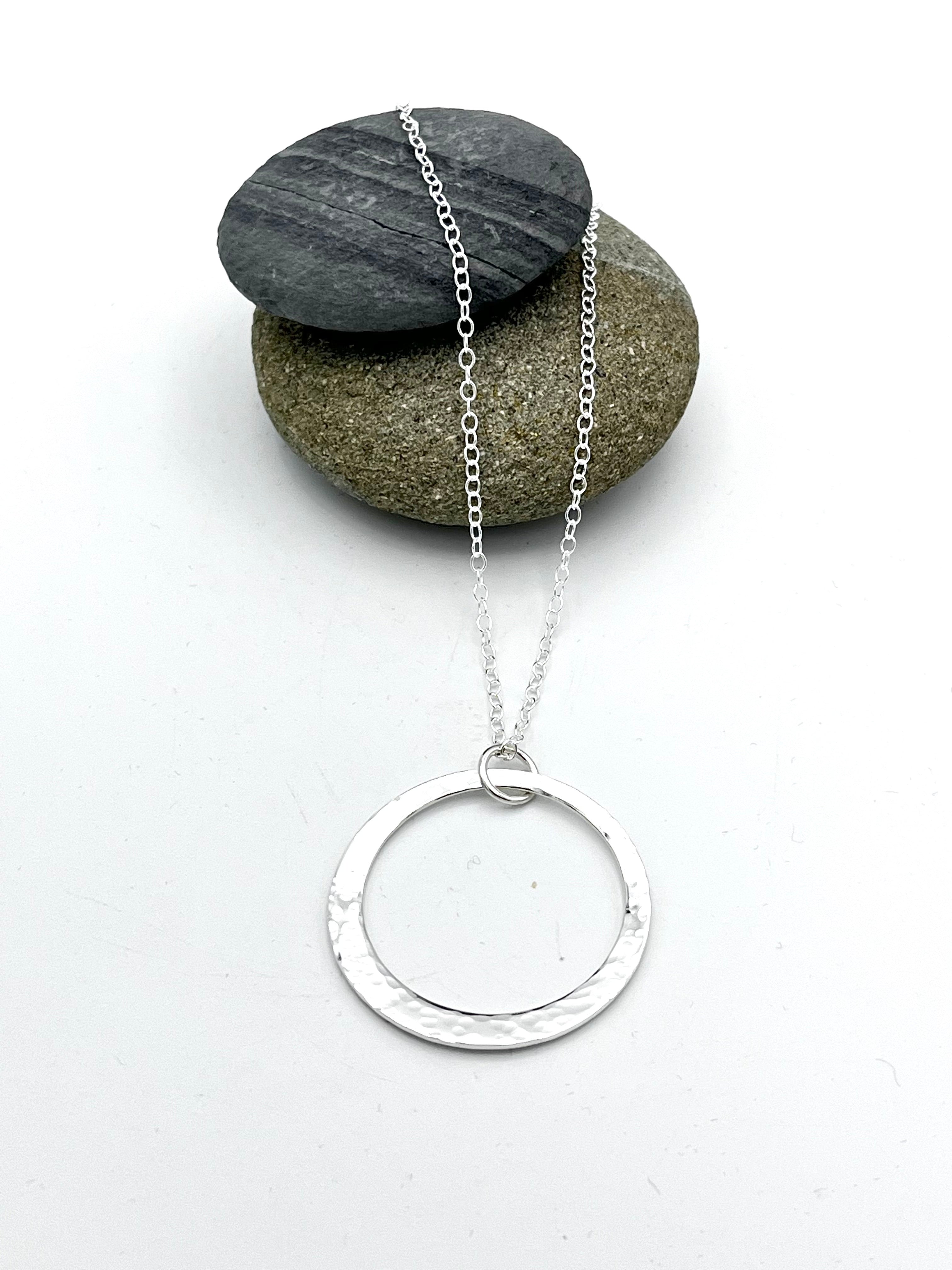 Sterling Silver Pendant. Single offset ring pendant 32mm wide hammered finish