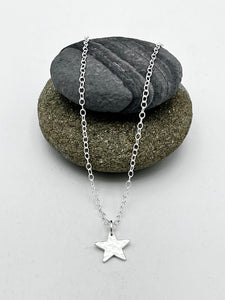 Single Star pendant 10mm wide hammered finish on 16" chain