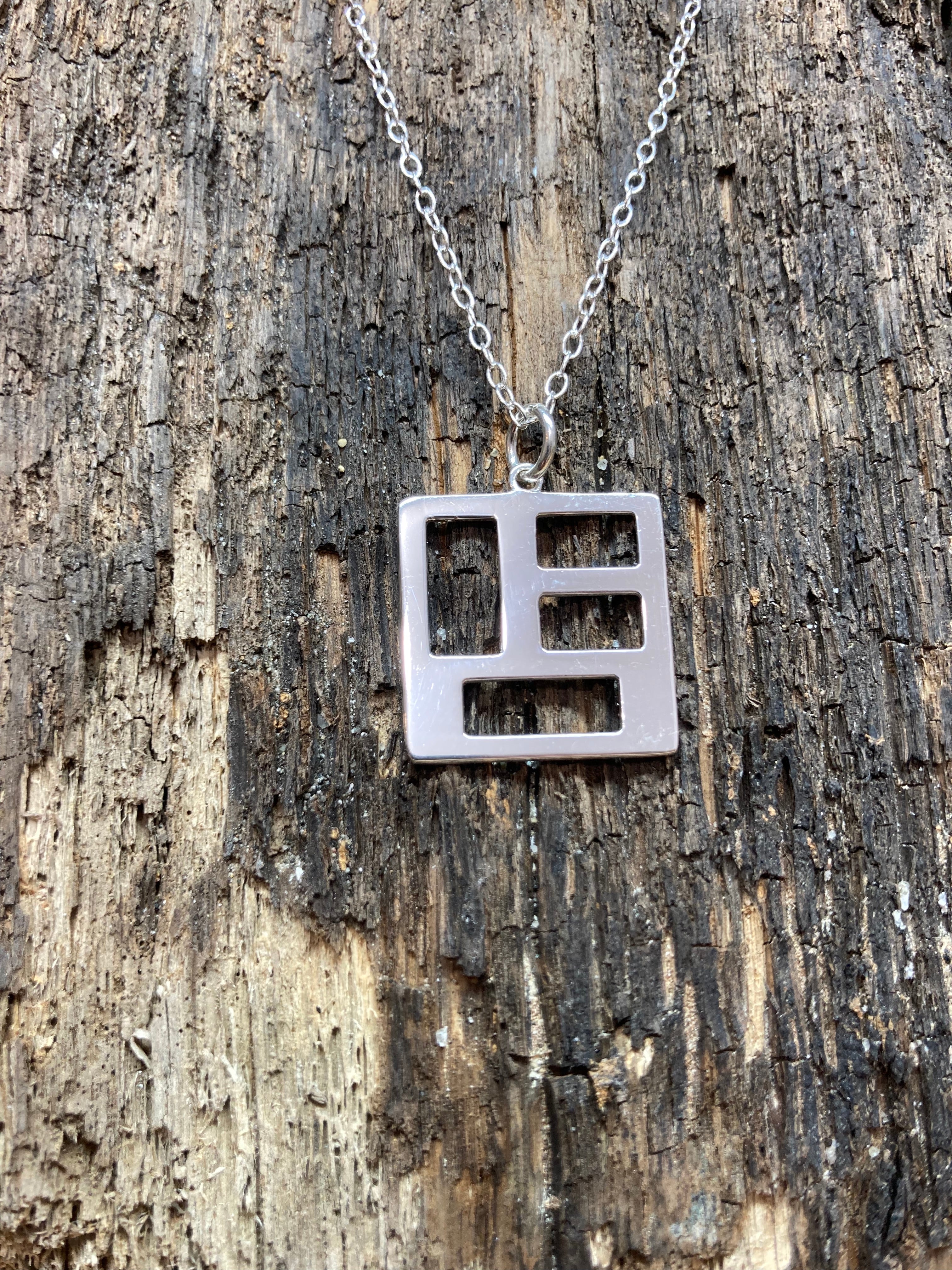 Sterling Silver 25mm polished geometric square pendant on 16" trace chain