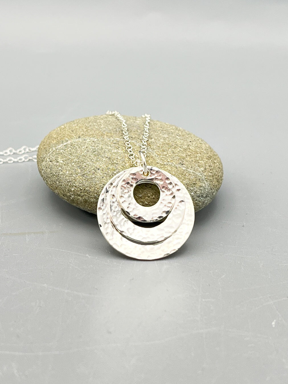 Sterling Silver triple washer design hammered pendant on a 16" chain
