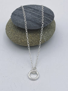Sterling Silver single small circle of life ring pendant polished finish on 16" trace chain