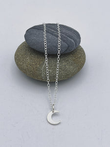 Sterling Silver single small crescent moon pendant polished finish on 16" trace chain