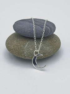 Sterling Silver single medium crescent moon pendant polished finish on 16" trace chain