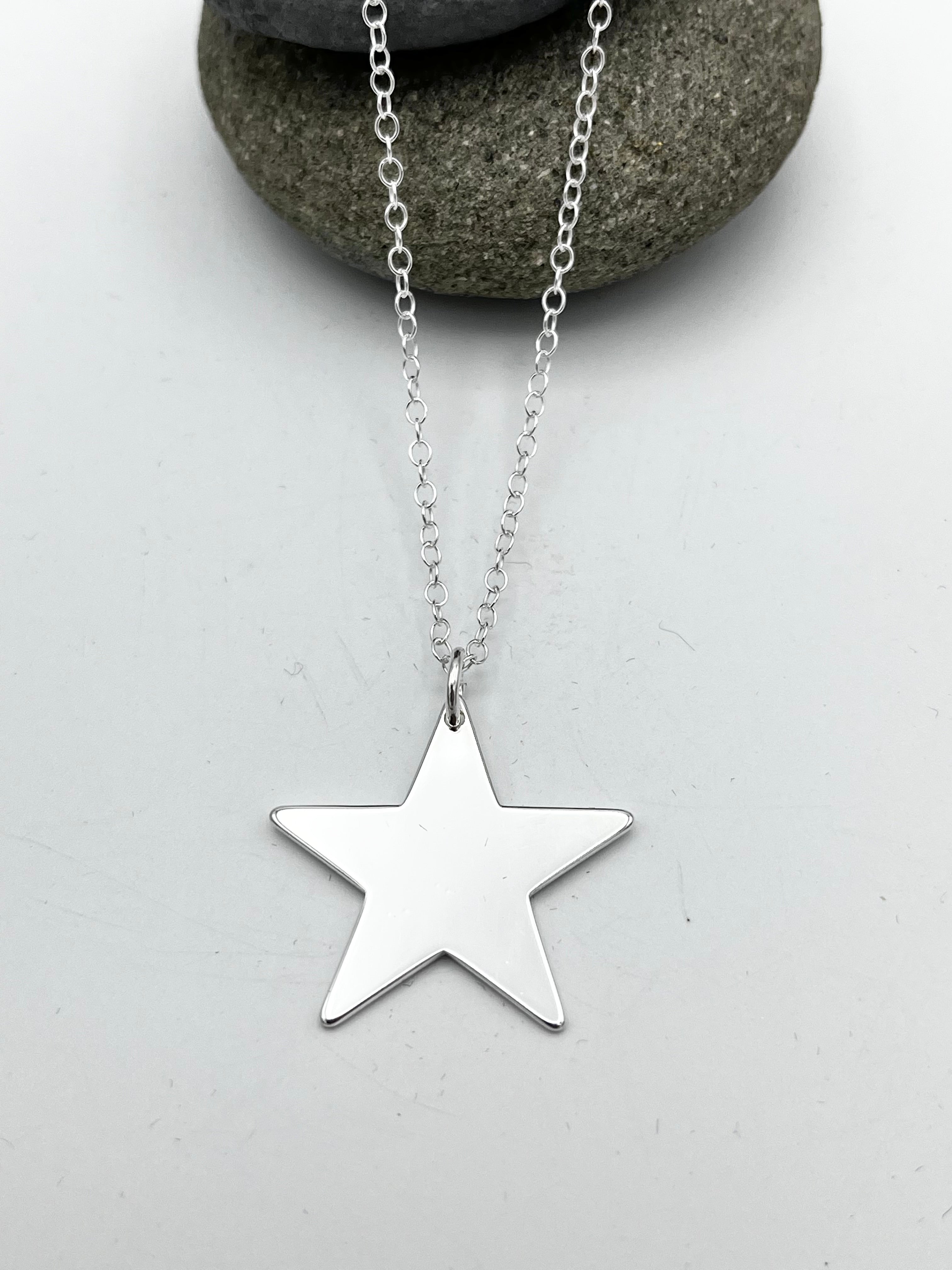 Single Star pendant 25mm wide polished finish on 16" chain
