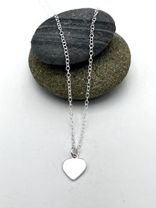 Heart pendant 10mm wide polished finish on 16" trace chain