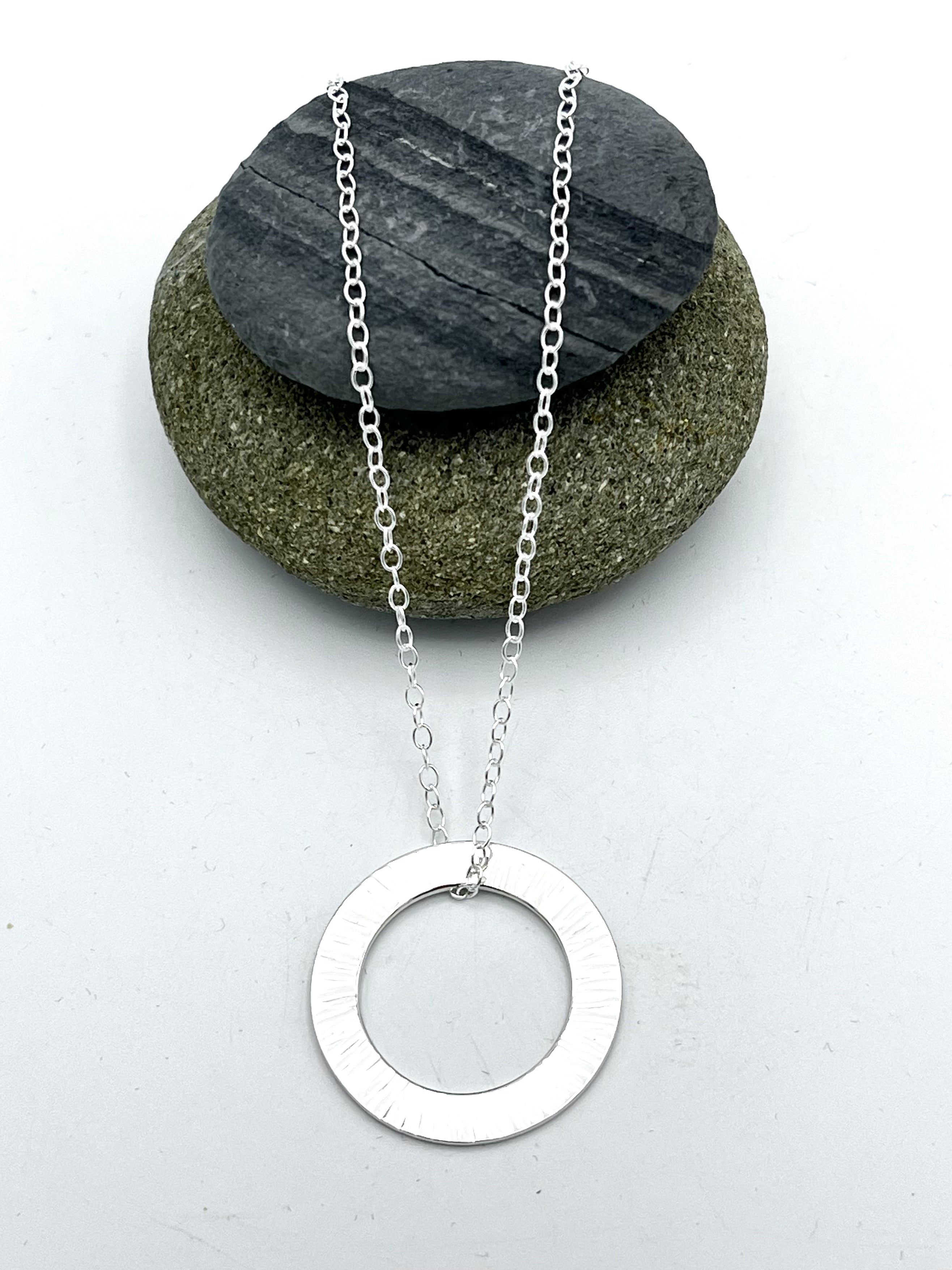 Washer pendant 25mm wide hammered finish on 16" trace chain