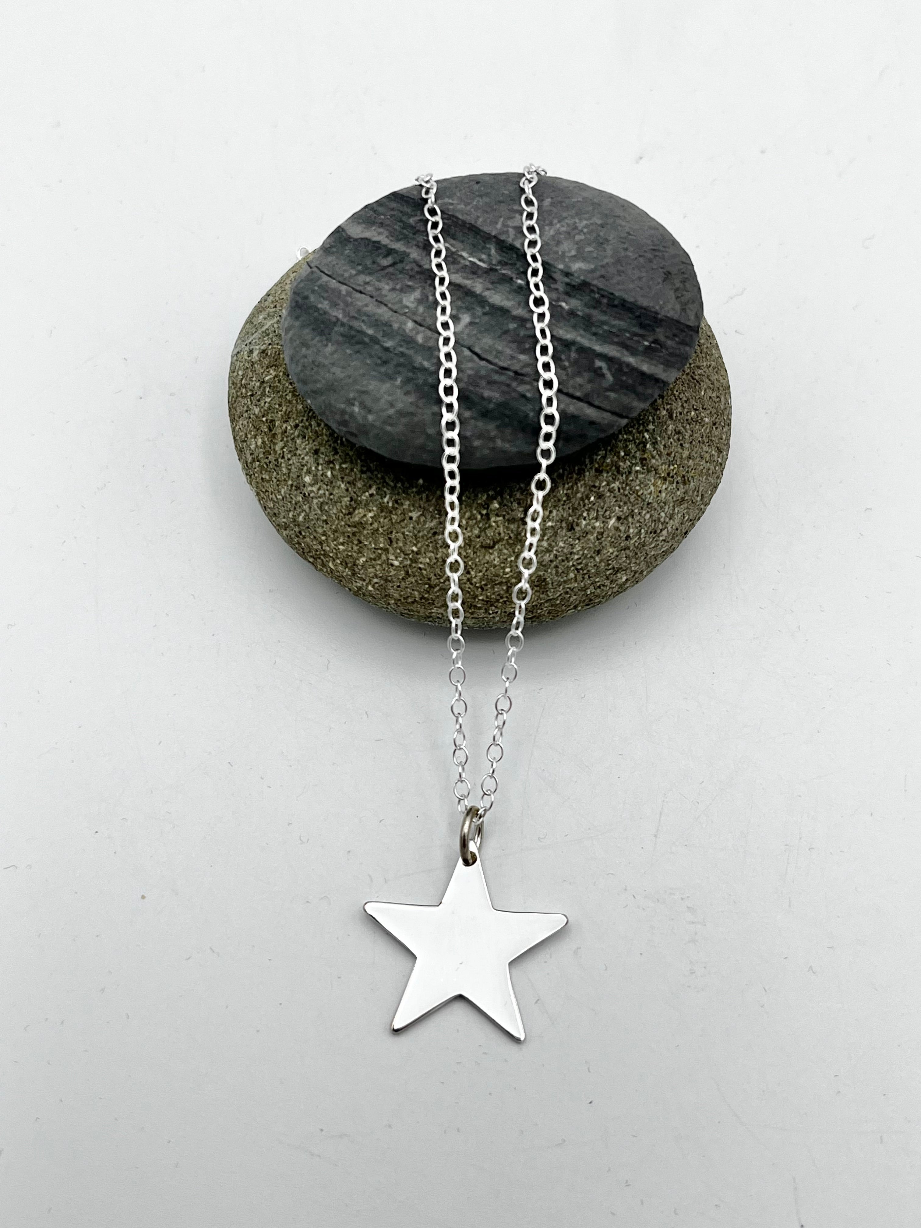Single Star pendant 20mm wide polished finish on 16" chain