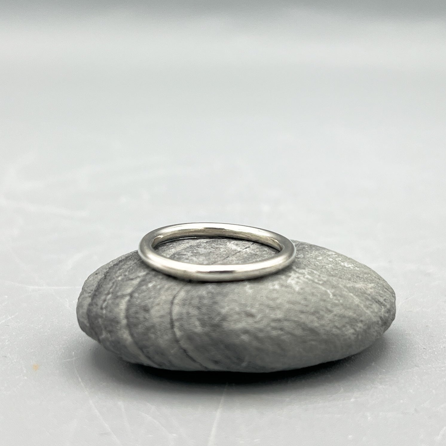 Sterling Silver Ring. 2mm round wire polished ring size 'K.5'