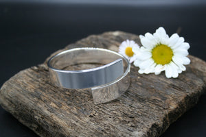 Sterling Silver Bangle. Crossover polished 70mm x 32mm x 3mm flat silver